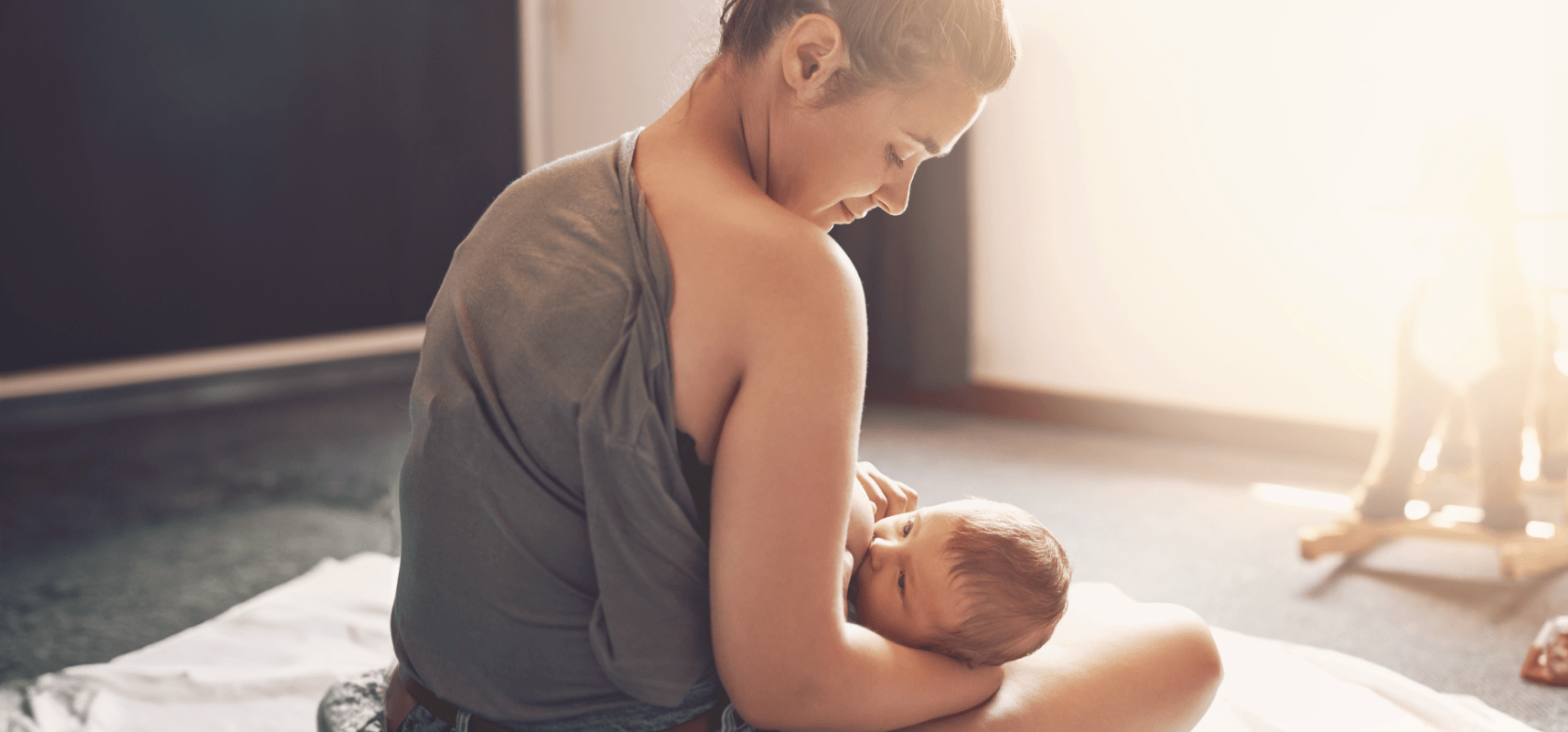 mom breastfeeding baby